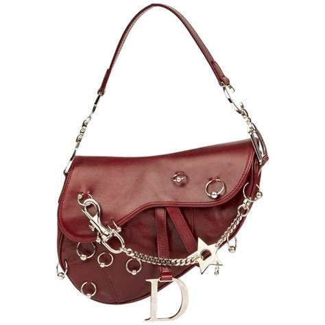 dior saddle bag piercing